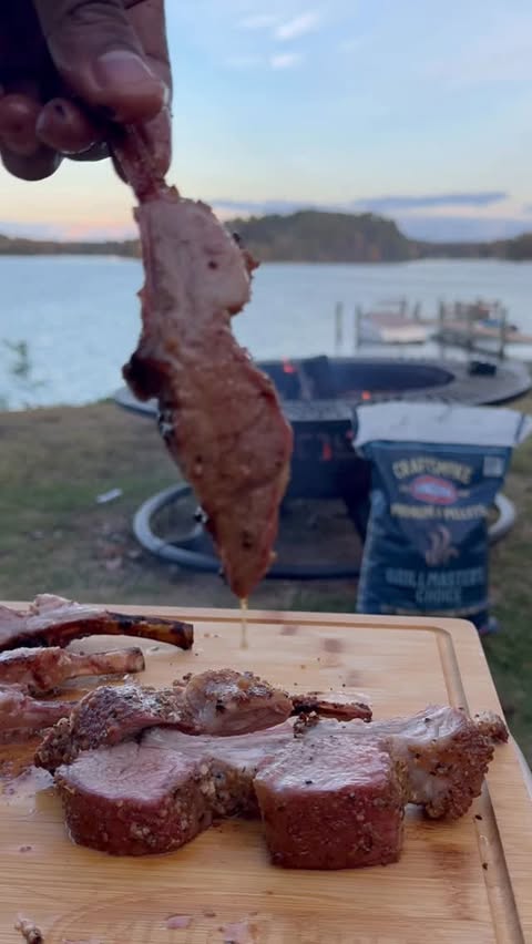 Instagram post by @grubwithjus for Kingsford. Caption reads: Smoked lamb chops hittin’ different on the pellet....