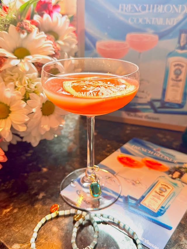 Instagram post by @swiftieinkc for Bombay Sapphire. Caption reads: [...] ! CHEERS TAYLOR AND TRAVIS!!! 🥂 🍊....