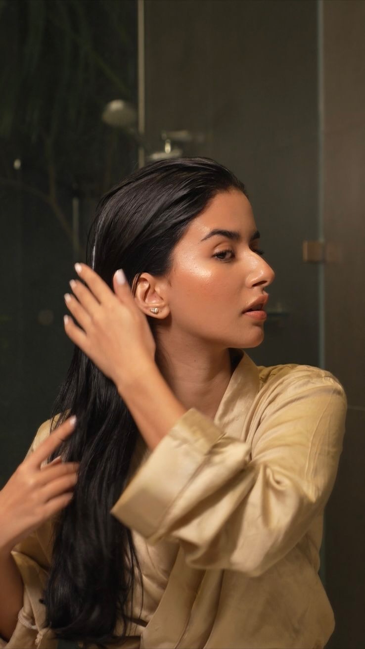 Instagram post by @vrindasurii for Kama Ayurveda. Caption reads: The iconic Bringadi collection, now reborn as....