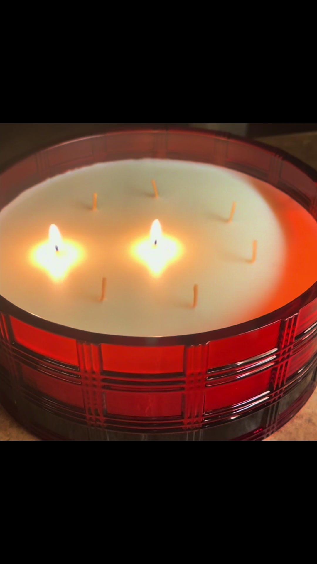 TikTok post by @worldaccordingtojuji for QVC. Caption reads: [...] #candles #homedecor #catsoftiktok #home....