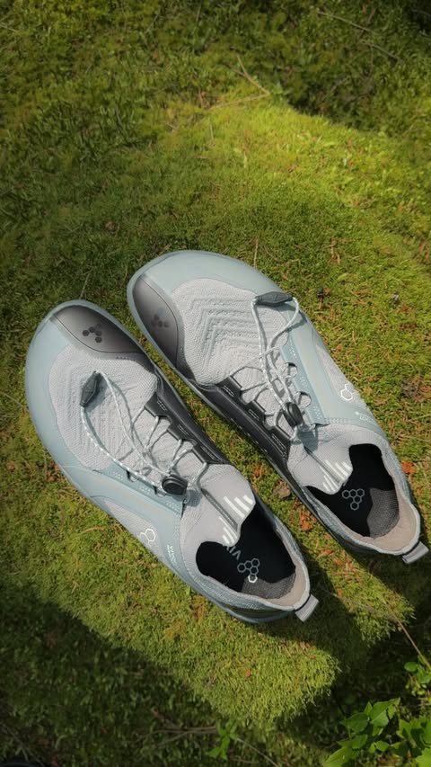 Instagram post by @amber0utside for VIVOBAREFOOT. Caption reads: Reconnecting and unwinding with the @vivobarefoot....