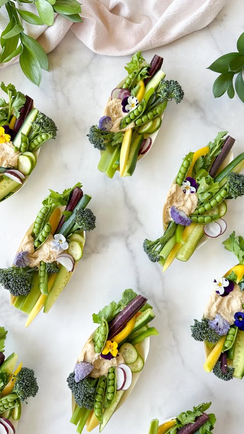 Instagram post by @berryandtheboards for Taste of Home. Caption reads: Crunch Crudités Canoes 🛶🥦🥒🍆

Aka, the perfect....