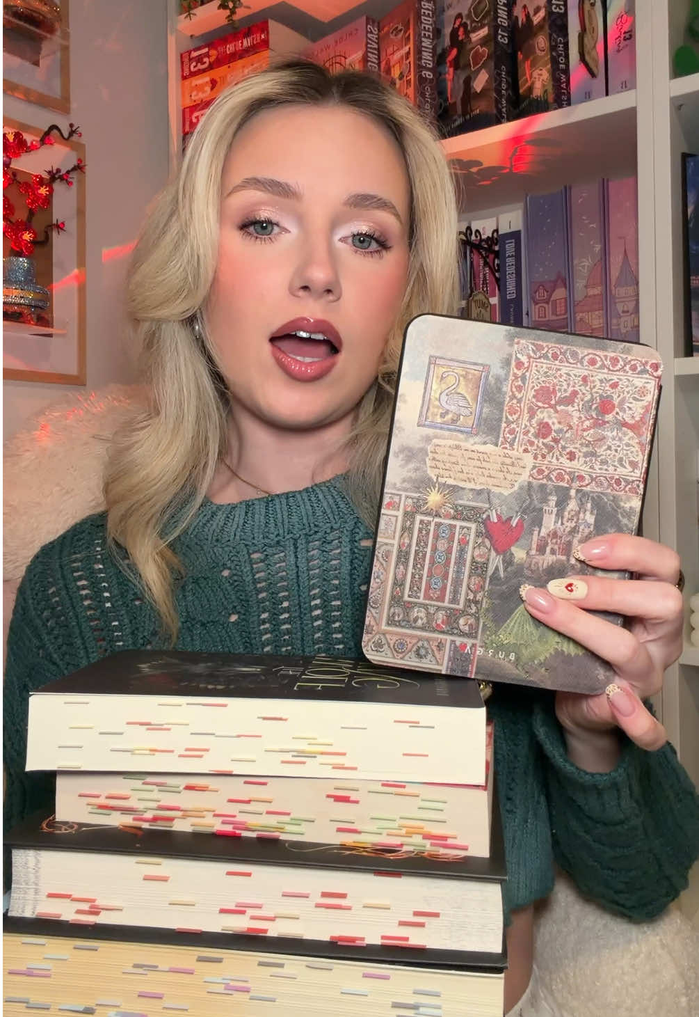 TikTok post by @yannareads for BURGA. Caption reads: [...] romantasy series featuring my matching....