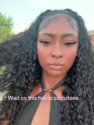 TikTok post by @luv.4.gene for CurlyMe Hair. Caption reads: I am so obsessed with @CurlyMe Hair #curlymehair....