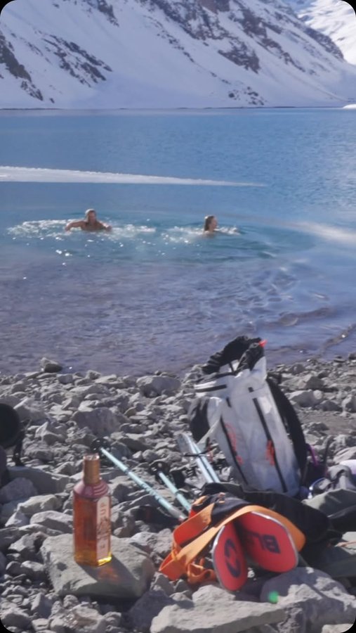 Instagram post by @elysesaugstad for TINCUP Whiskey. Caption reads: When you can ski right up to the lake’s edge at....