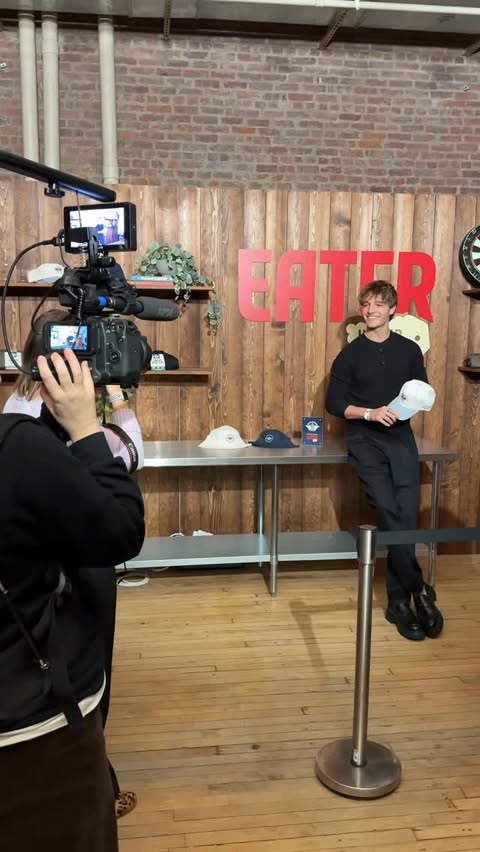 Instagram post by @zaneecarter for Eater. Caption reads: [...] embroidered @dockerskhakis hat from @eater....