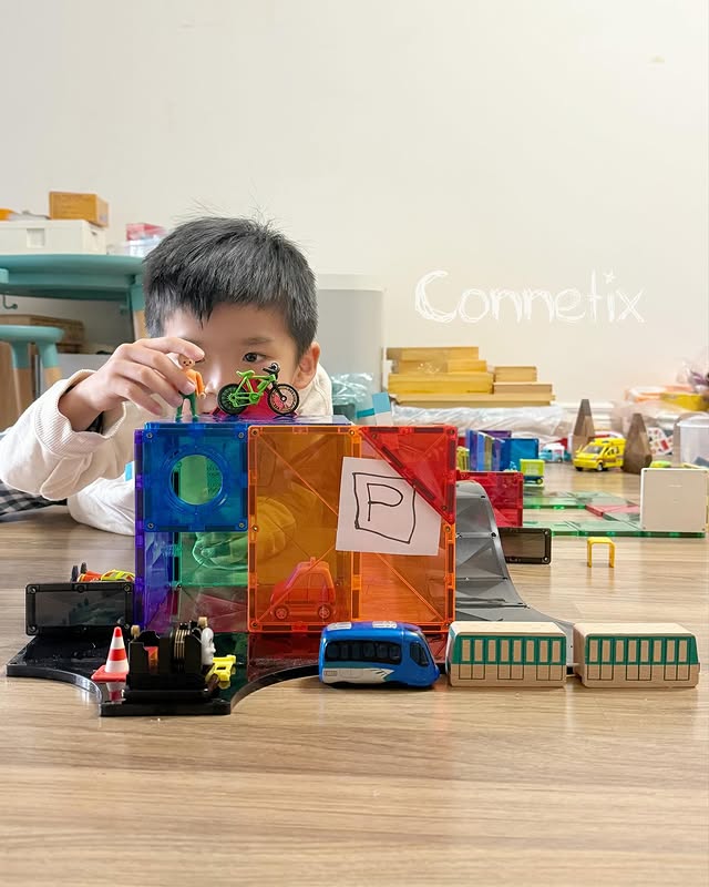 Instagram post by @babychan_adrian for PLAYMOBIL. Caption reads: How can you combine your existing #CONNETIXTiles....