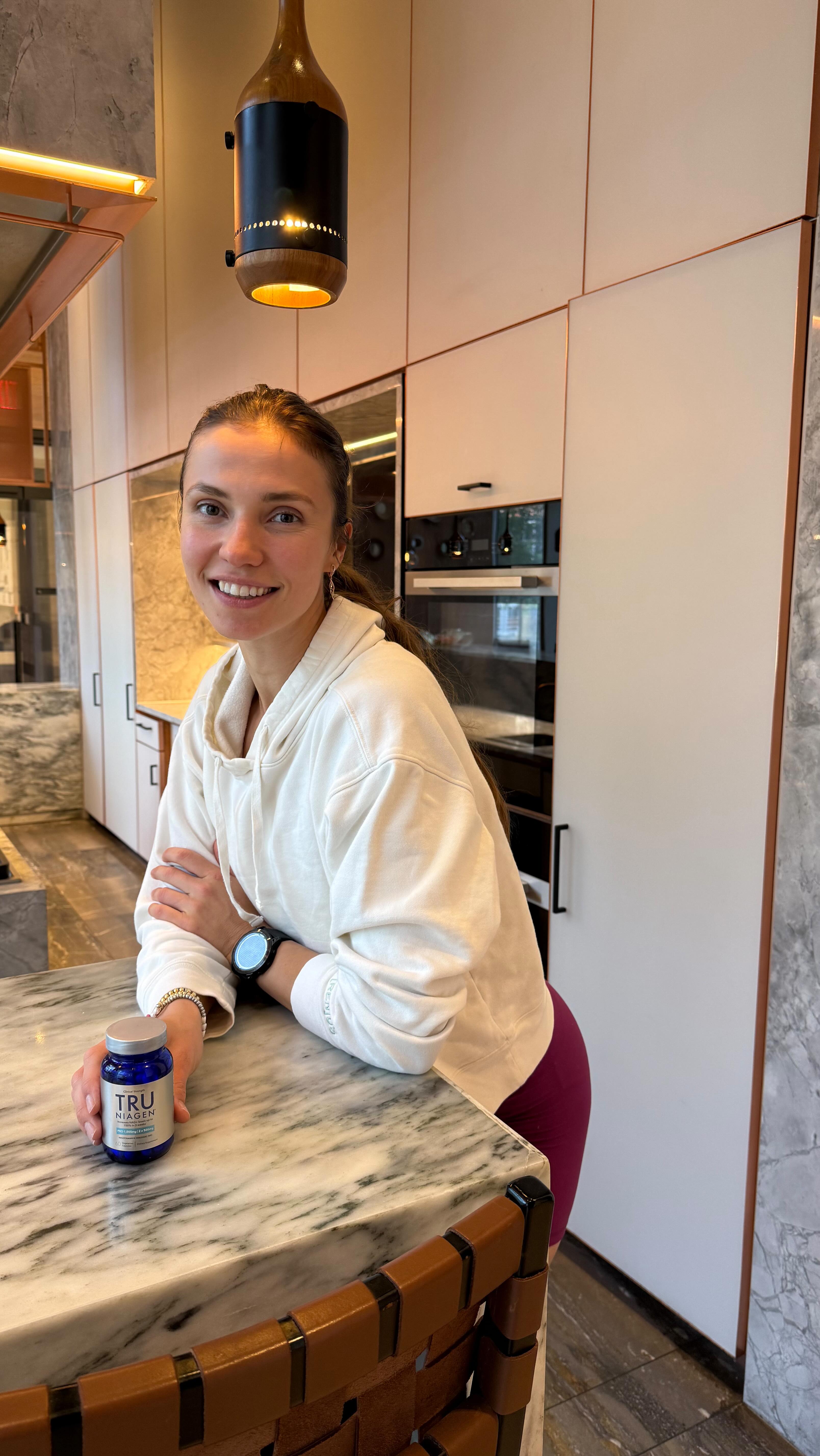 Instagram post by @olesia.nyc for TRU NIAGEN. Caption reads: After I drop my daughter off at school, I carve....