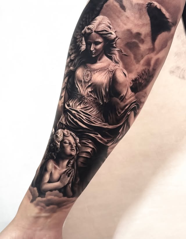 Instagram post by @cathy_tattoo for EMALLA Official. Caption reads: He said ，he hoped one archangel would represent....