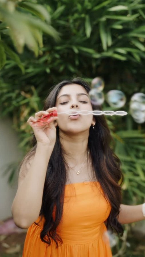 Instagram post by @meenaaxi_ for Santoor Stay Young. Caption reads: Who need filters when your skin speaks for itself?....