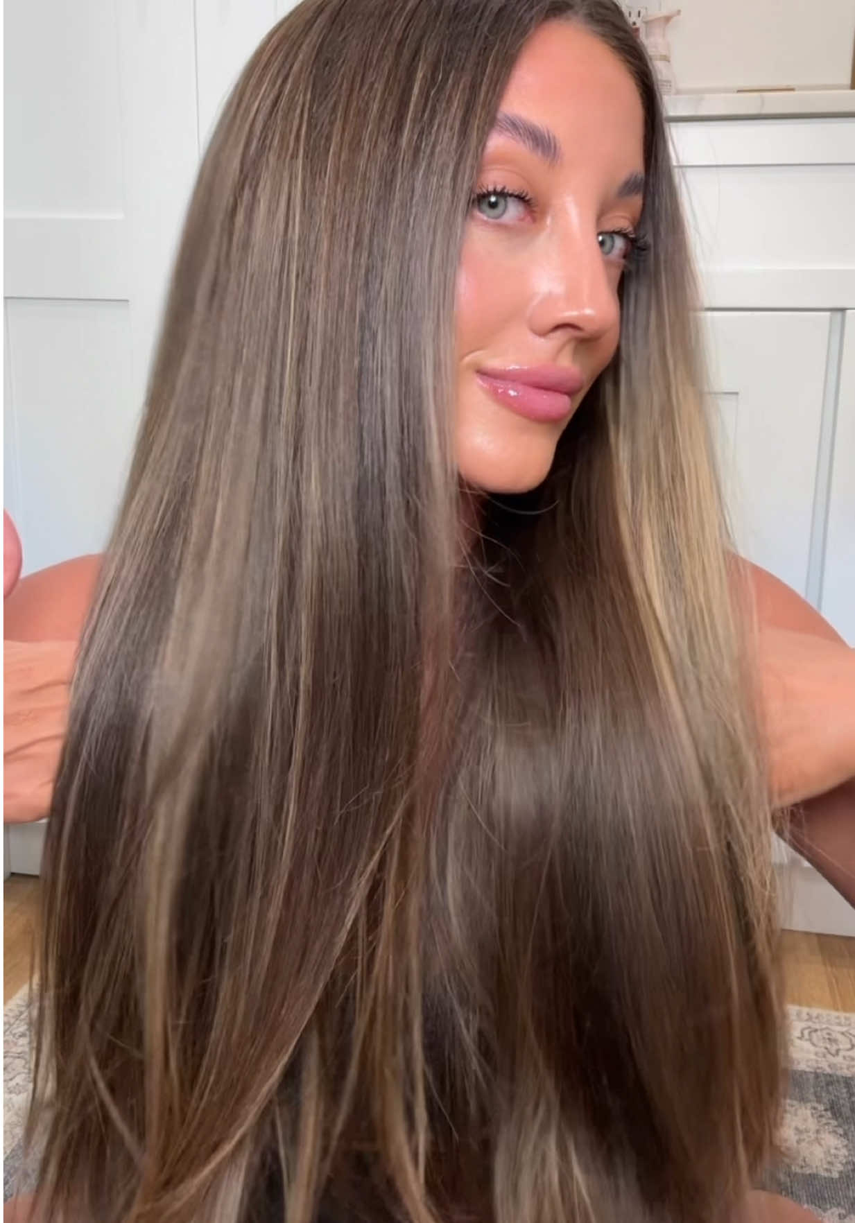 TikTok post by @theadrianelia for L’ange Hair. Caption reads: [...] Get them here 👇🏽🛍️🛒 @langehair....