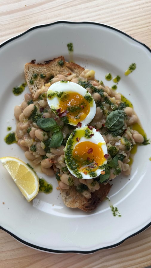 Instagram post by @toastedtable for Brodo. Caption reads: Creamy brothy beans on toast with a spicy basil....