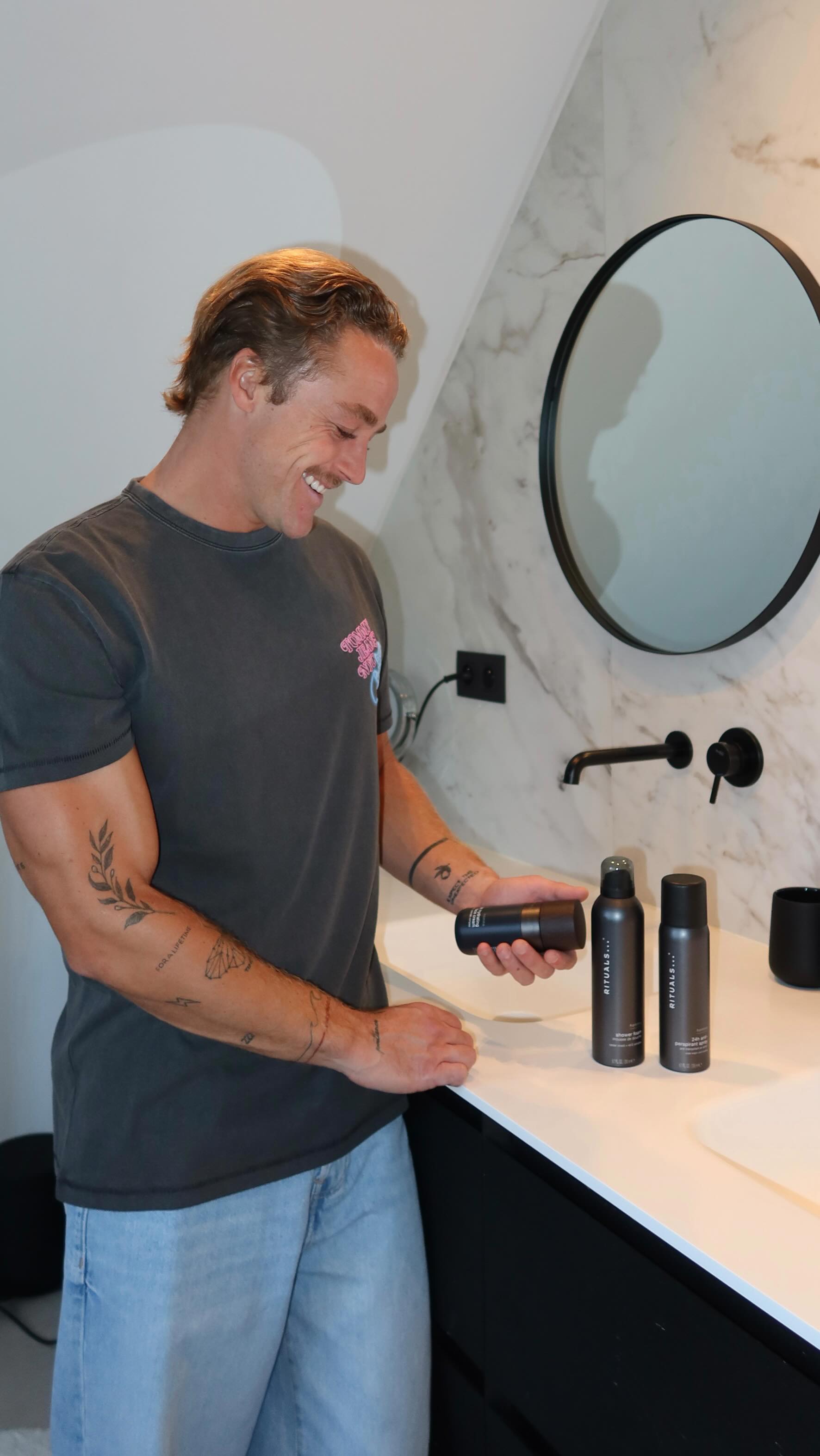 Instagram post by @olivierbolsius for Rituals Cosmetics. Caption reads: Homme Bodycare @ritualscosmetics after workout. My....