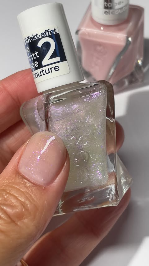 Instagram post by @nailsbymh for essie. Caption reads: [...] strawberry milk mani, using gel by @essie....