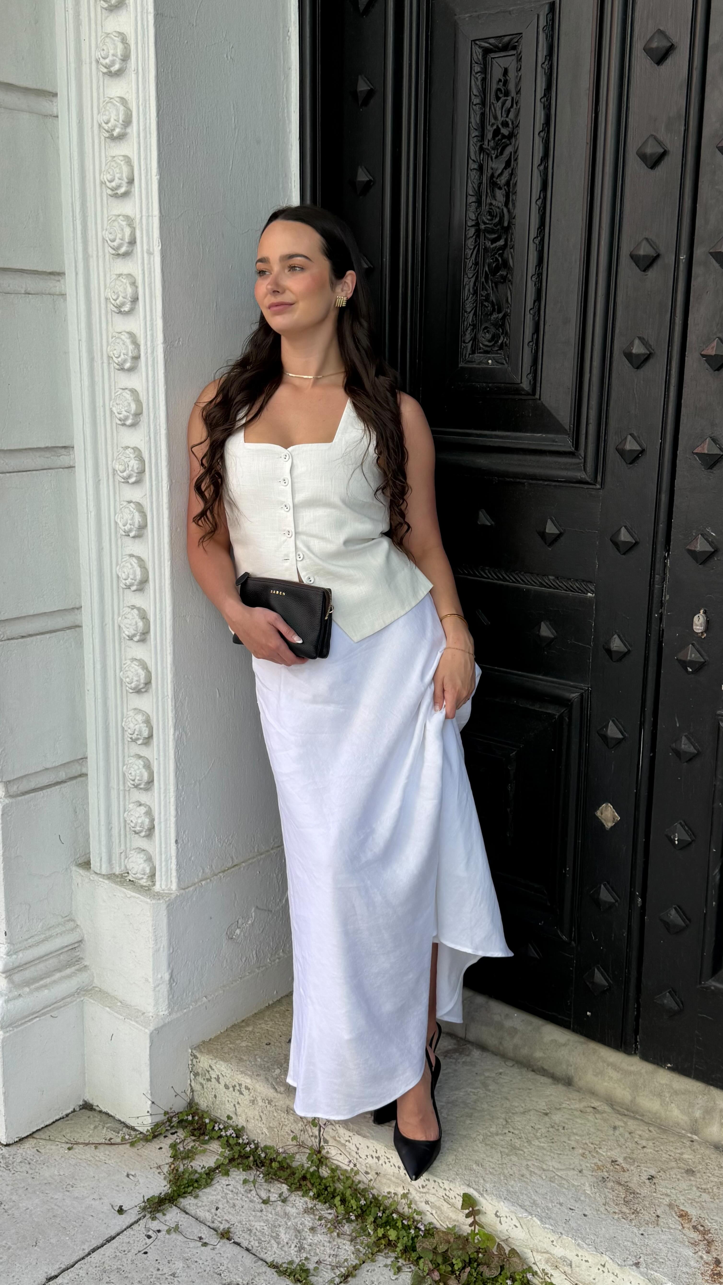 Instagram post by @georgiiabradley for Flo & Frankie. Caption reads: From day to night, the Lagos skirt from RE:Union....