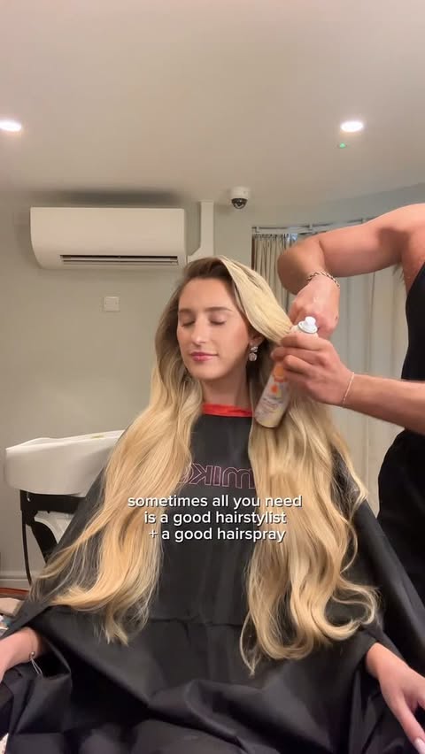 Instagram post by @theaussierapunzel for amika. Caption reads: [...] it’s a great hair day 🫶🏼✨ Using: @amika....