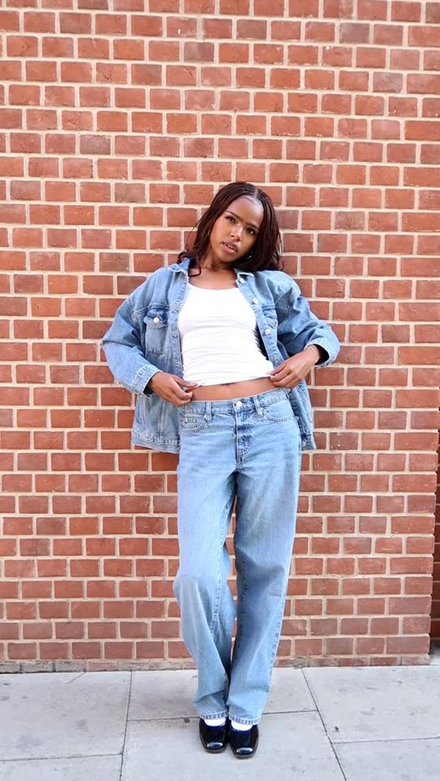 Instagram post by @ria.caeliya for DKNY. Caption reads: AD Who said basics had to be basic? 🖤 The @dkny....