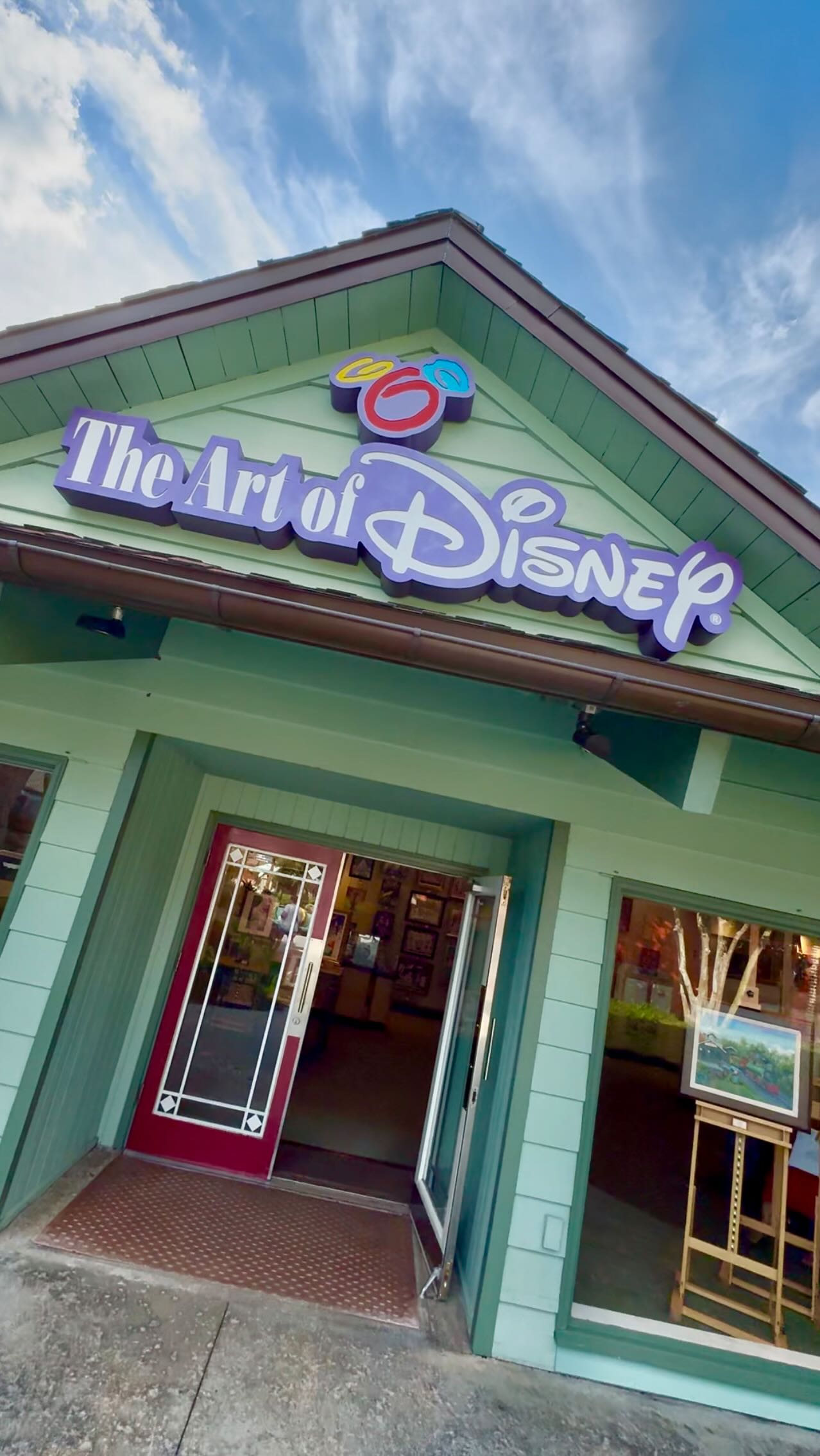 Instagram post by @thethemeparkdad for Thomas Kinkade Studios. Caption reads: Zoey’s room is coming together and this piece from....