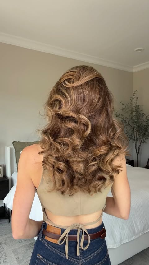 Instagram post by @nicholeciotti for Kitsch. Caption reads: My biggest hack for glossy curls? @mykitsch Shine....
