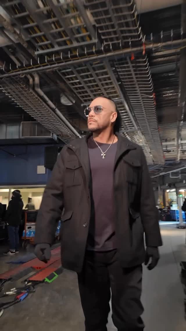 Instagram post by @archerofinfamy for WWE. Caption reads: PRIEST vs. BLACK. AMBULANCE MATCH. TONIGHT.....