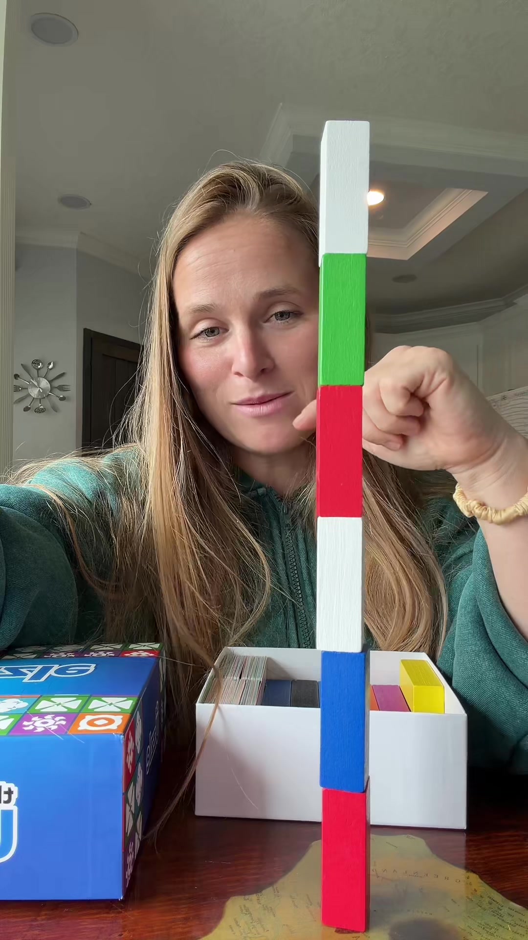 TikTok post by @scrunchymomof3 for The Uzzle. Caption reads: @The Uzzle game night duo is on sale [...].