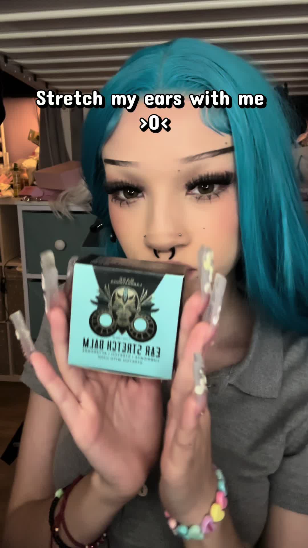 TikTok post by @melanie._.hi for Base Laboratories. Caption reads: [...] mind all the wigs in the back… @Base....