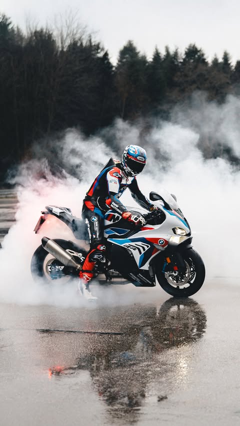 Instagram post by @markusreiterberger28 for BMW Motorrad. Caption reads: Happy H🍩lidays from BMW Motorrad! 🤗....