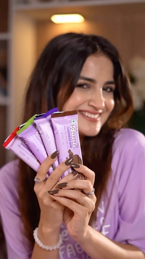 Instagram post by @shubhi.joshi4 for Bauli. Caption reads: Snacking just got an upgrade with Bauli Goodness....