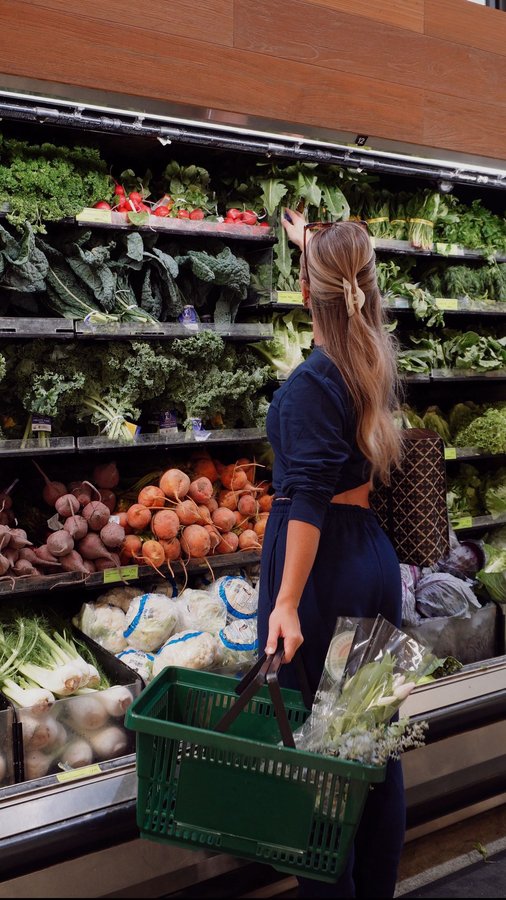 Instagram post by @sydneyraye__ for Russell Athletic. Caption reads: out and about with @russellathletic....