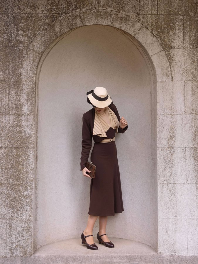 Instagram post by @carepinglo for The House of Foxy. Caption reads: [...] with the Connie dress in brown the....