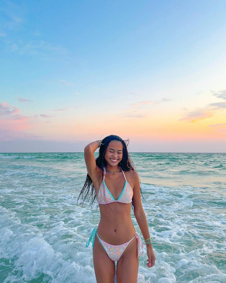 Instagram post by @itscaroxline for BLACKBOUGHSWIM. Caption reads: [...] your fighter: 🌸🌊🐬💫 wearing....