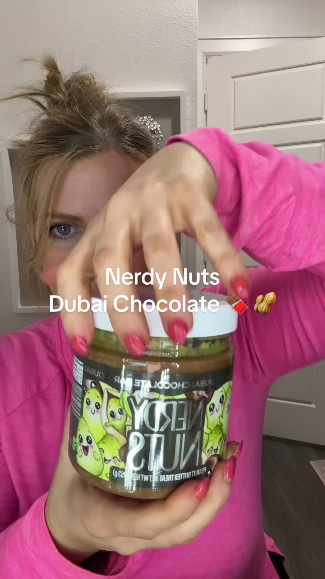TikTok post by @1985chelle for Nerdy Nuts. Caption reads: Nerdy Nuts Dubai Chocolate Bar 🍫 💚 @Nerdy Nuts....