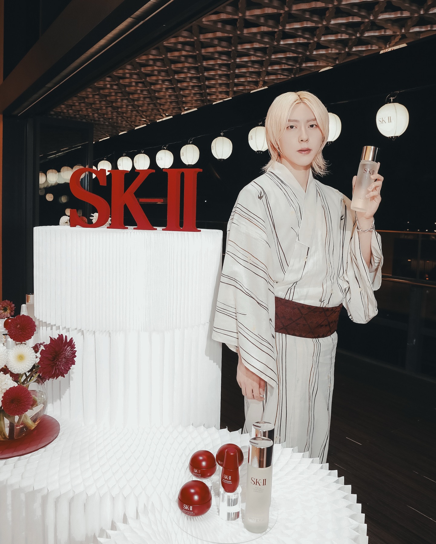 Instagram post by @hirosasaki_official for SK-II. Caption reads: SK-IIのSUMMER....