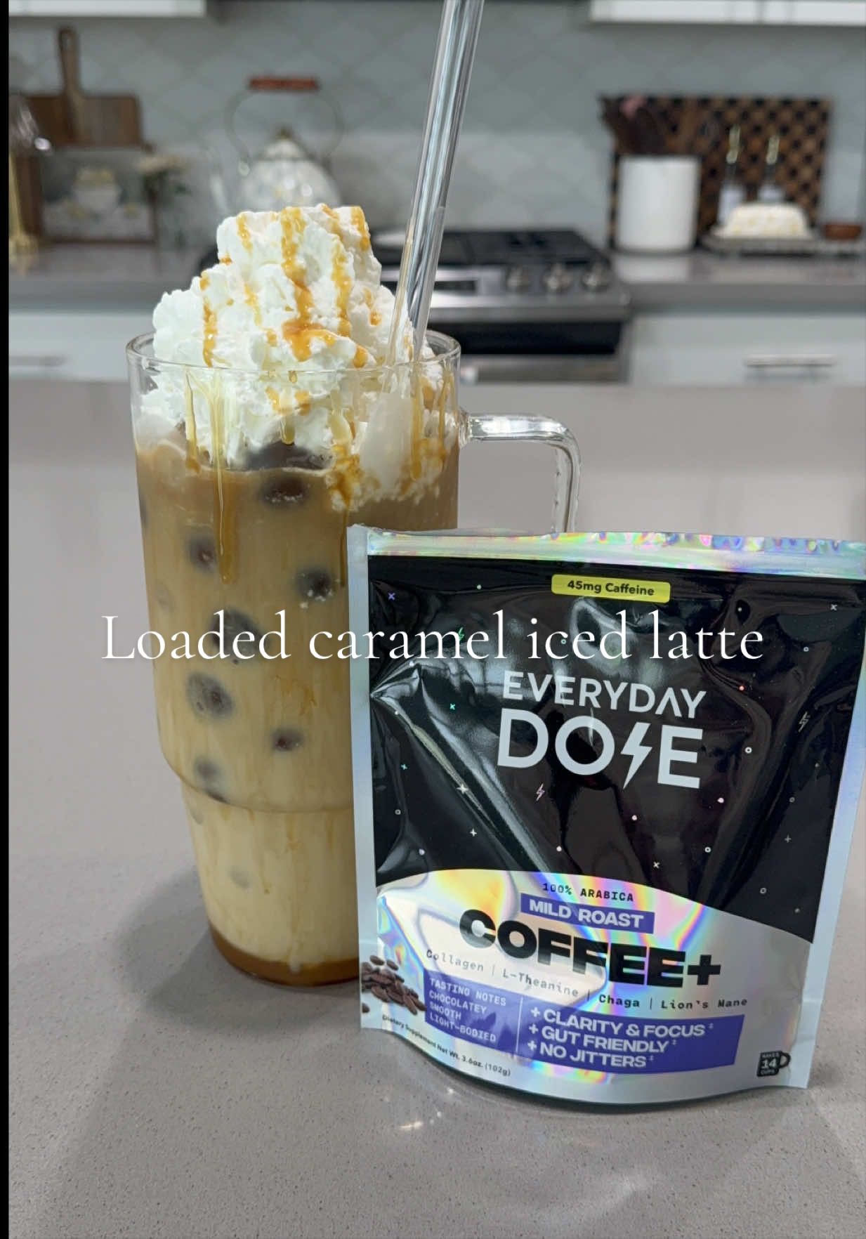 TikTok post by @thedailyammie for Everyday Dose. Caption reads: Loaded caramel iced latte with @Everyday Dose ☕....