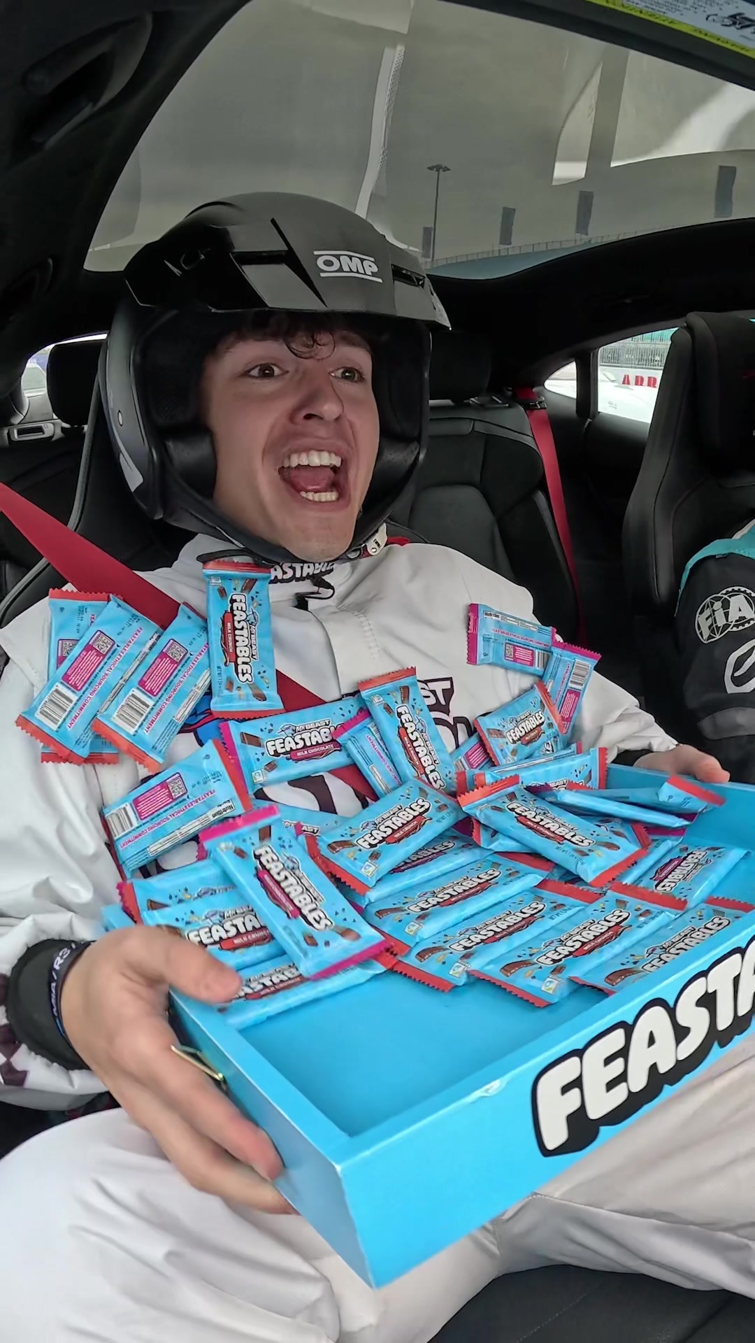 TikTok post by @moreclixtv for Feastables. Caption reads: Eating Feastables at 150mph 🏎️ @Formula E [...].