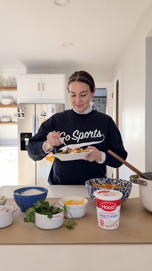 Instagram post by @carly for Hood. Caption reads: 🏈🍴 As a #HoodPartner, I’m bringing my A-game....