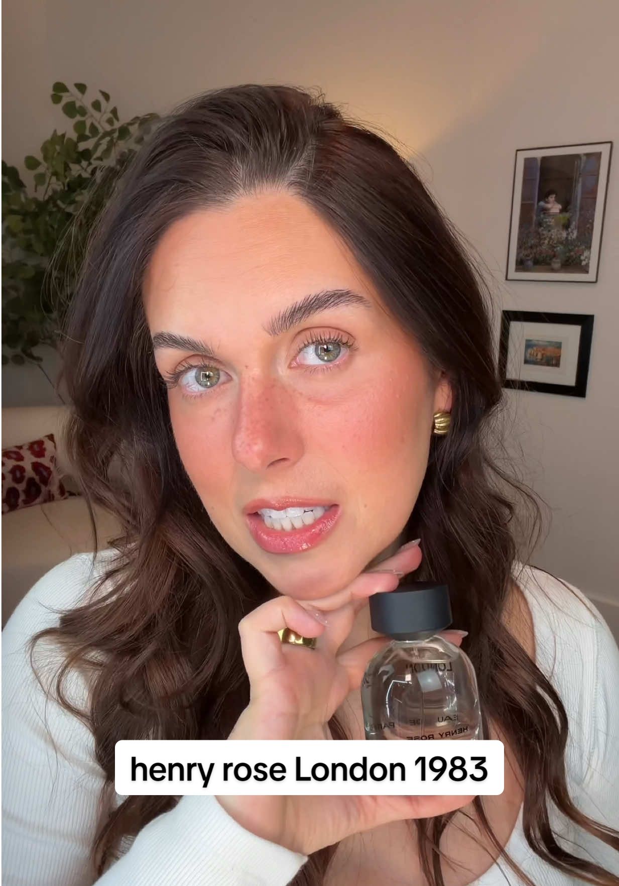 TikTok post by @rudiberry for Henry Rose. Caption reads: [...] Morgan it's signature scent worthy. @Henry....