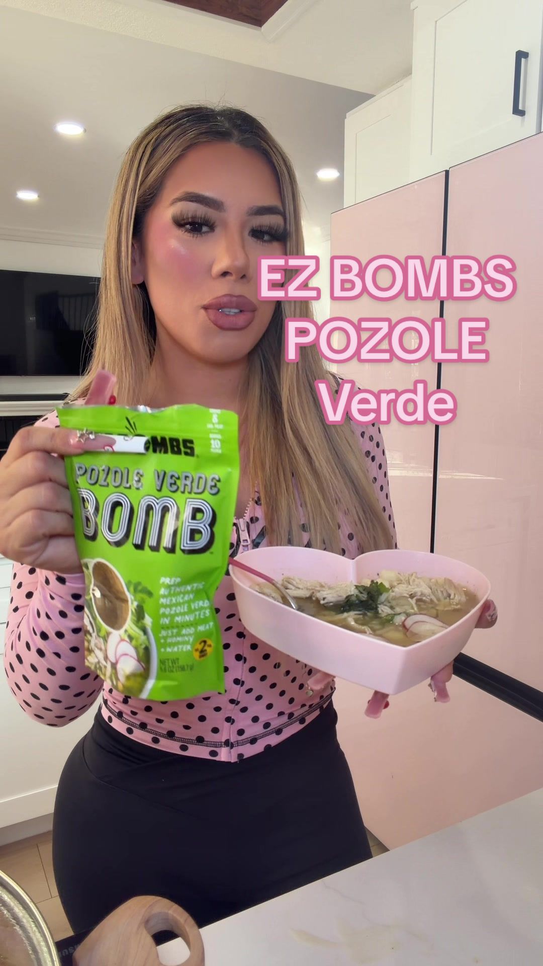 TikTok post by @lifesbetterwithkat for EZ Bombs. Caption reads: We are loving the new green pozole @EZ Bombs....