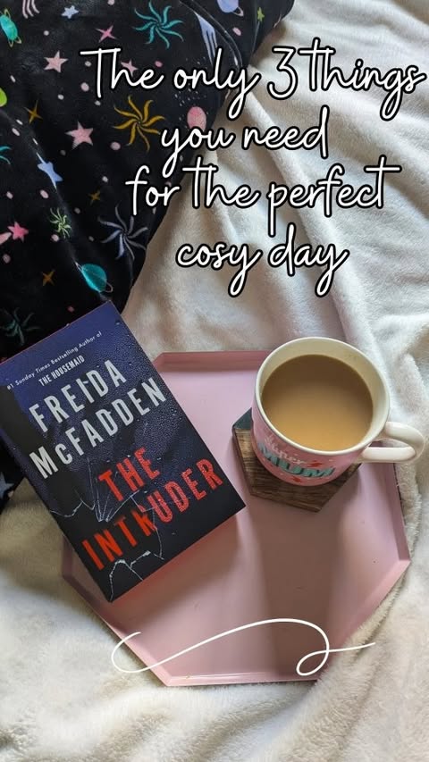 Instagram post by @its.a.hardback.life.x for The Oodie. Caption reads: ✨ Cosy day essentials ✨ What are your cosy day....
