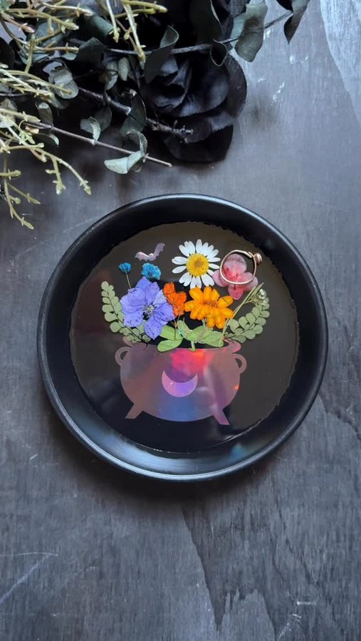 Instagram post by @midnight_cottage_co for Craft Resin. Caption reads: [...] 

Kick off this Spooky Season with Craft....