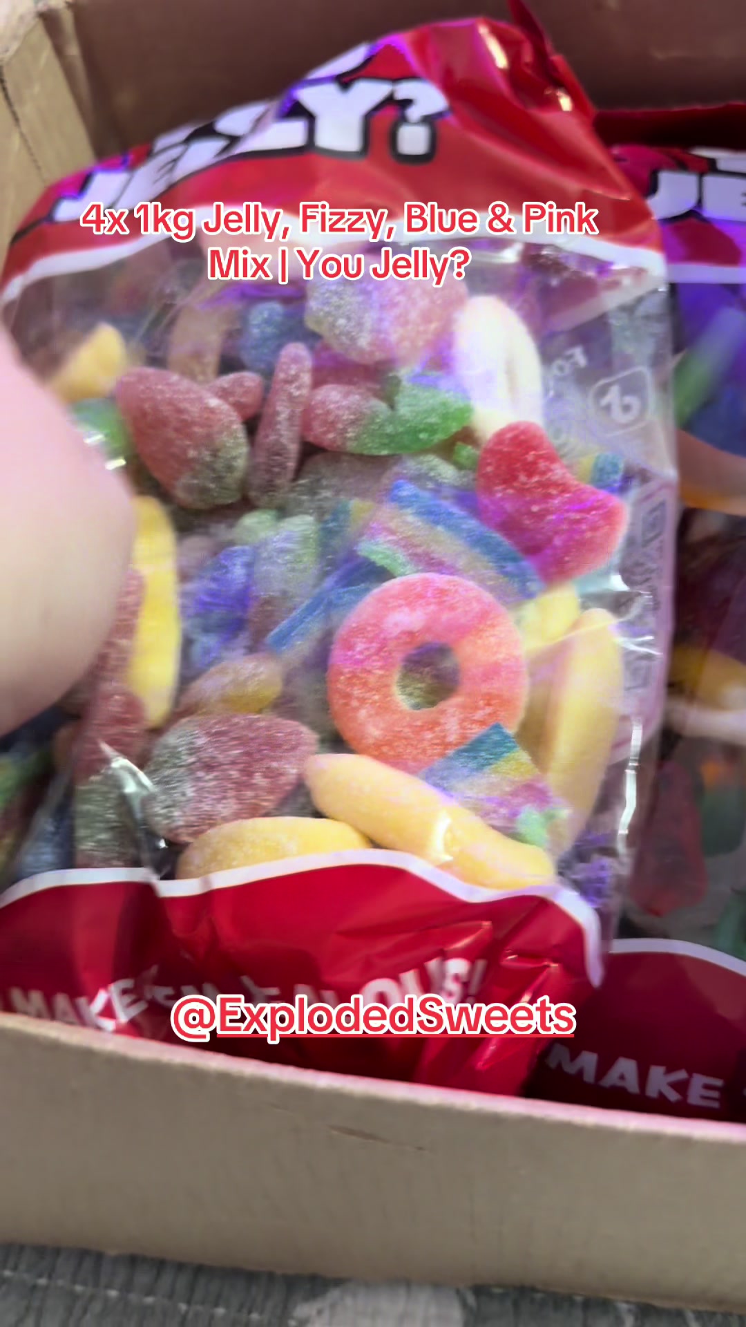 TikTok post by @emma_davies90 for Exploded Sweets. Caption reads: [...] this 4x 1kg You Jelly? mix by Exploded....