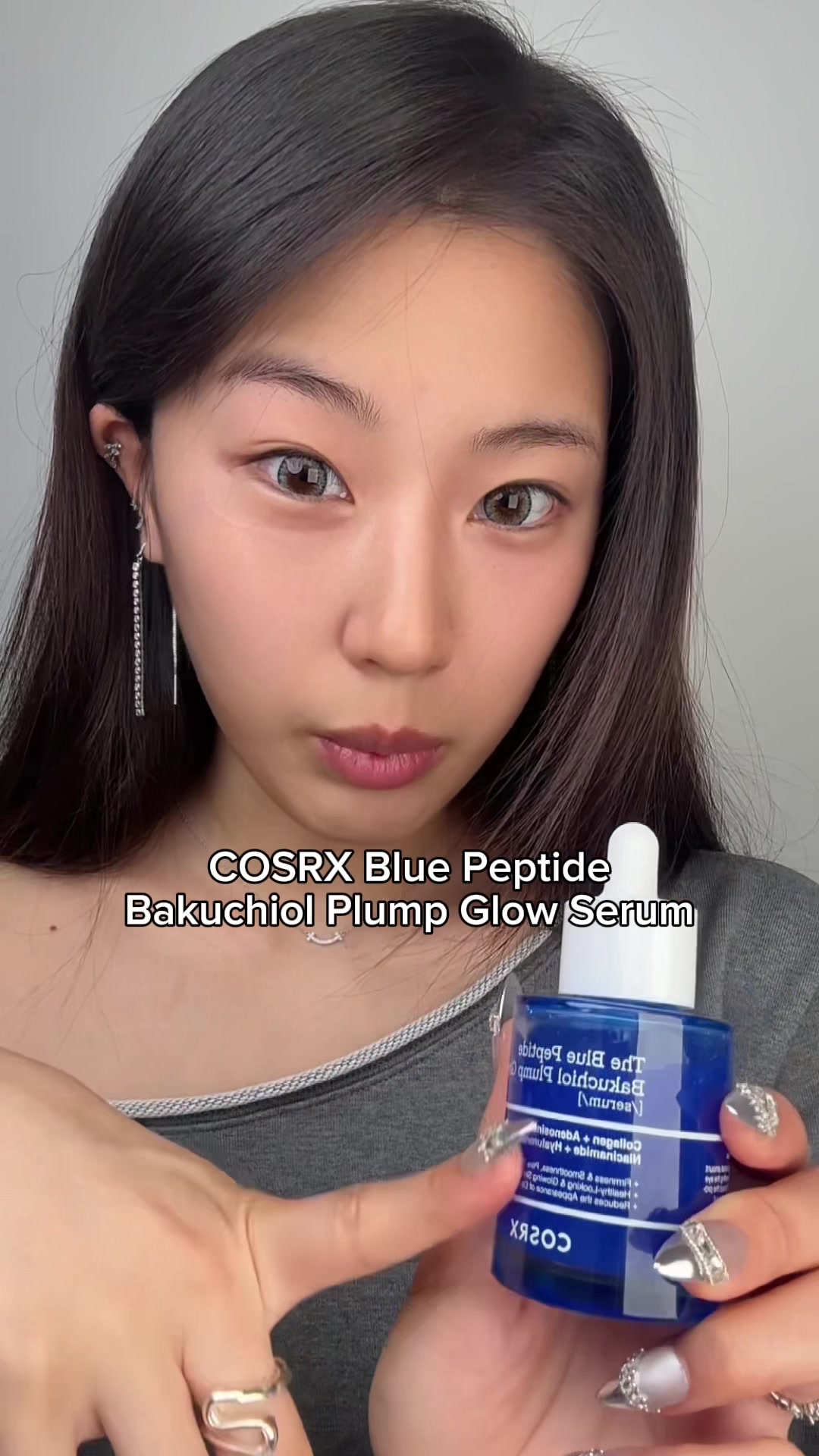 TikTok post by an influencer for COSRX. Caption reads: [...] of blue copper peptides!? @COSRX US @COSRX....