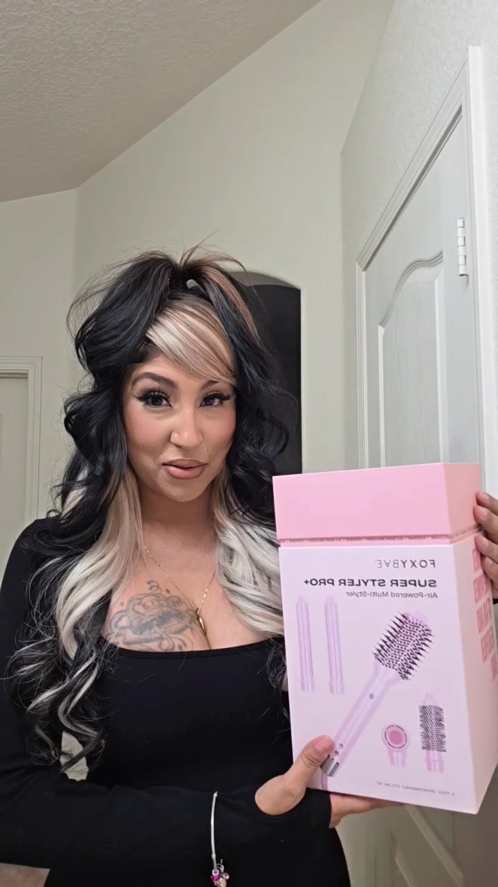 TikTok post by @crystalslayz for FoxyBae Hair. Caption reads: [...] Wrap! #fyp #hair #hairtoks #foxybae @FoxyBae....