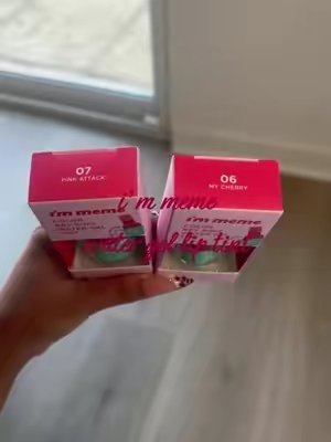 TikTok post by @nayeliguzmannn for I’M MEME. Caption reads: [...] to hang it on your bag 💄👛🍒 @i'm meme....