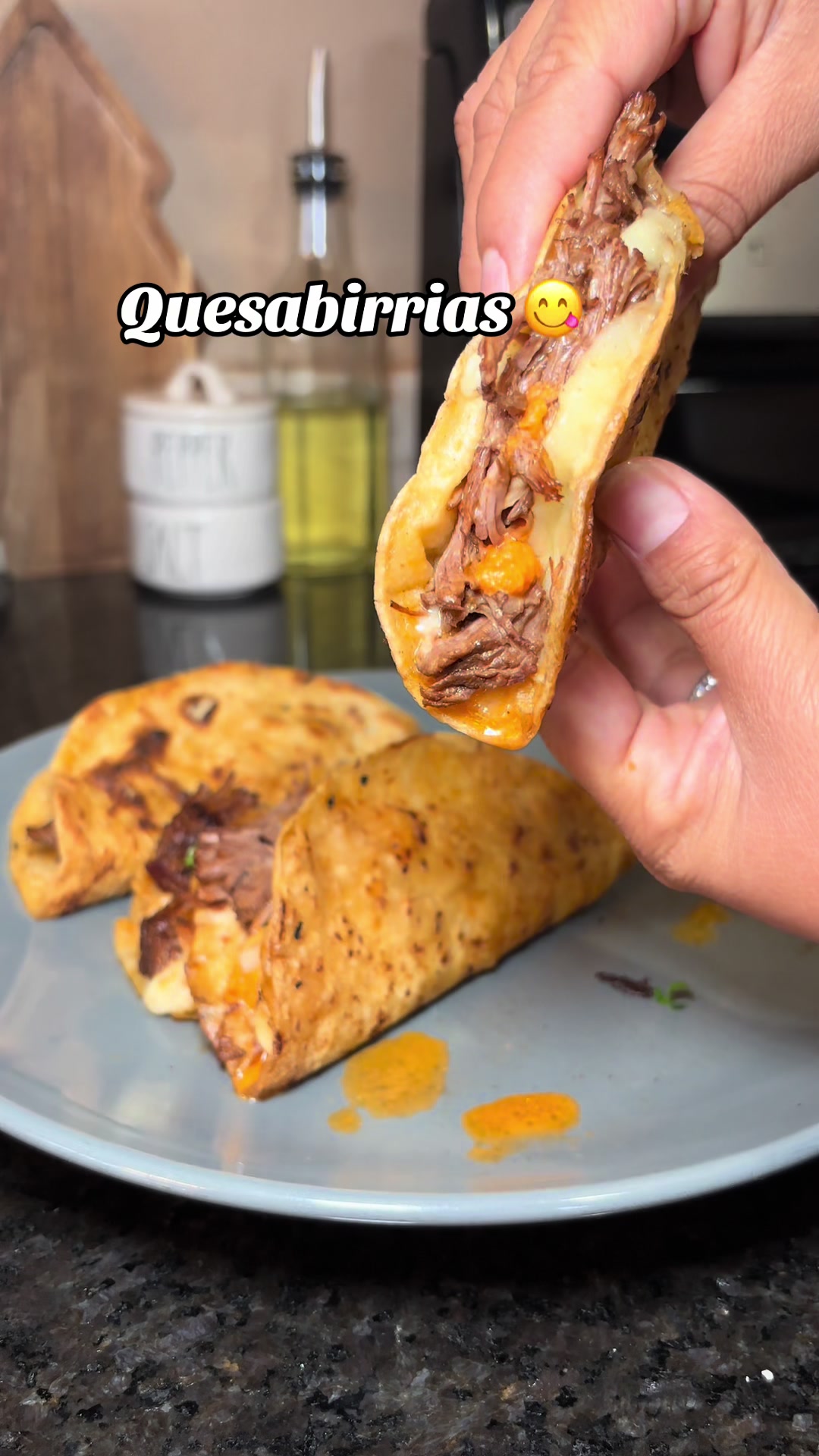 TikTok post by @mariacedilloo for EZ Bombs. Caption reads: Quesabirrias Recipe 😋  Crock pot recipe 3.5 lbs....