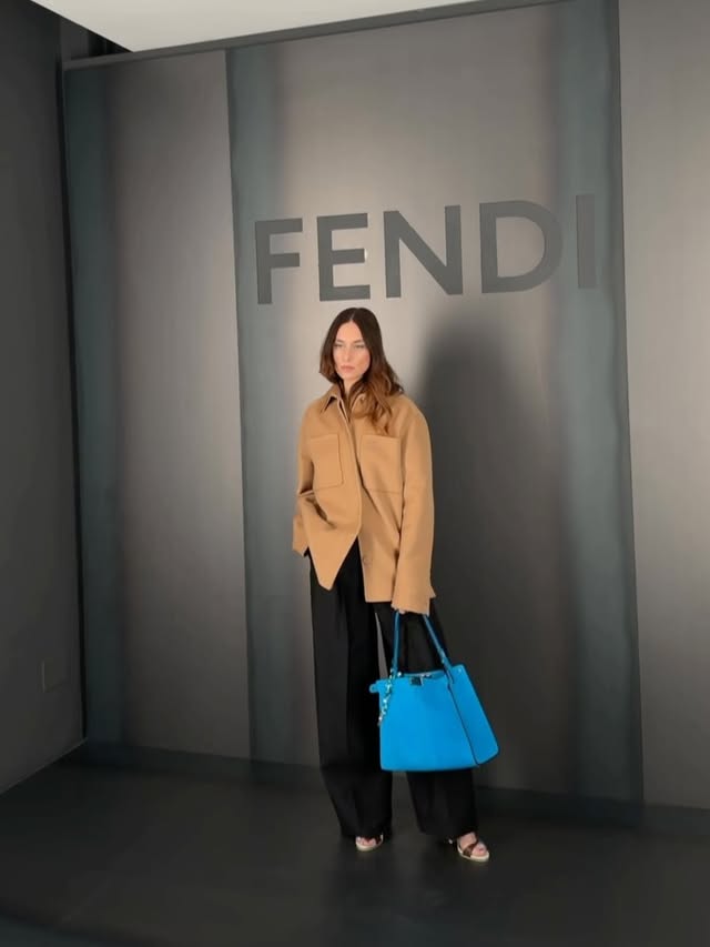 Instagram post by @erika_boldrin for Fendi. Caption reads: LESS I, MORE US. @fendi This show is significant....