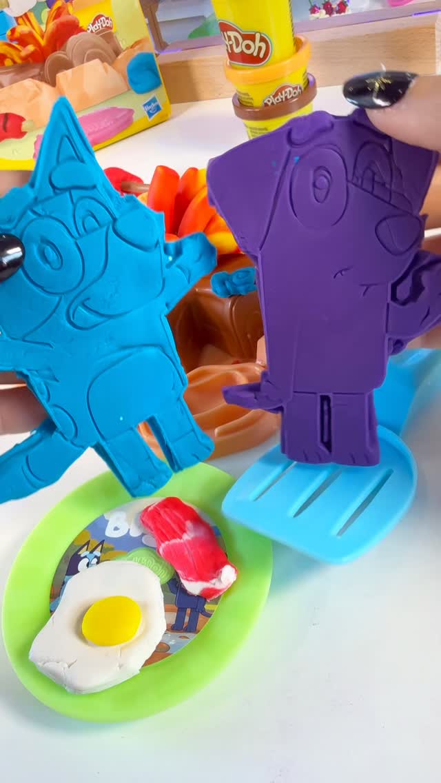 Instagram post by @dreamteamsworld for Play-Doh. Caption reads: Bluey Goes Camping Playdoh Playset #asmr #bluey....