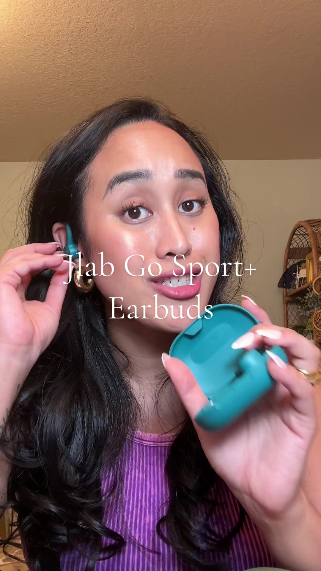TikTok post by @kusumabanana for JLab. Caption reads: [...] so I grabbed TWO 🎧🔥 These JLab Go Sport+....