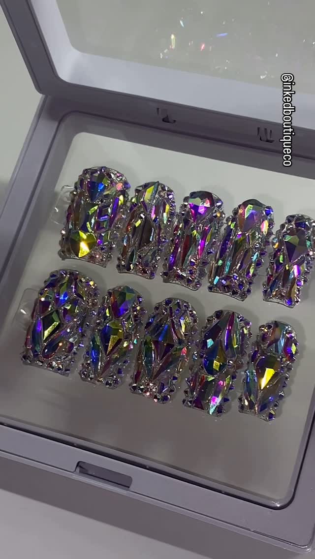 Instagram post by @nailzbyrissxo for Bluestreak Crystals. Caption reads: 💎😍✨ 

Using @bluestreakcrystals code: INKED....