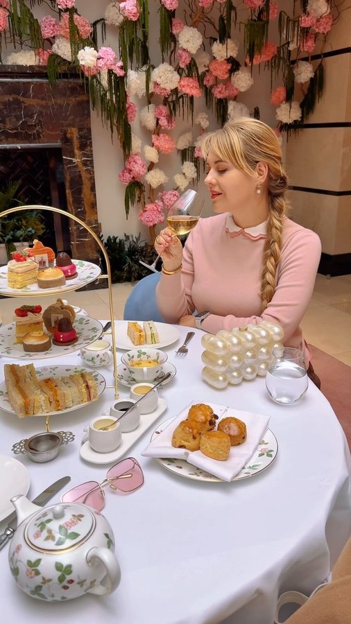 Instagram post by @purpurpurpur for Hilton Hotels & Resorts. Caption reads: ad New Royal InfiniTEA by @conradlondonsj....